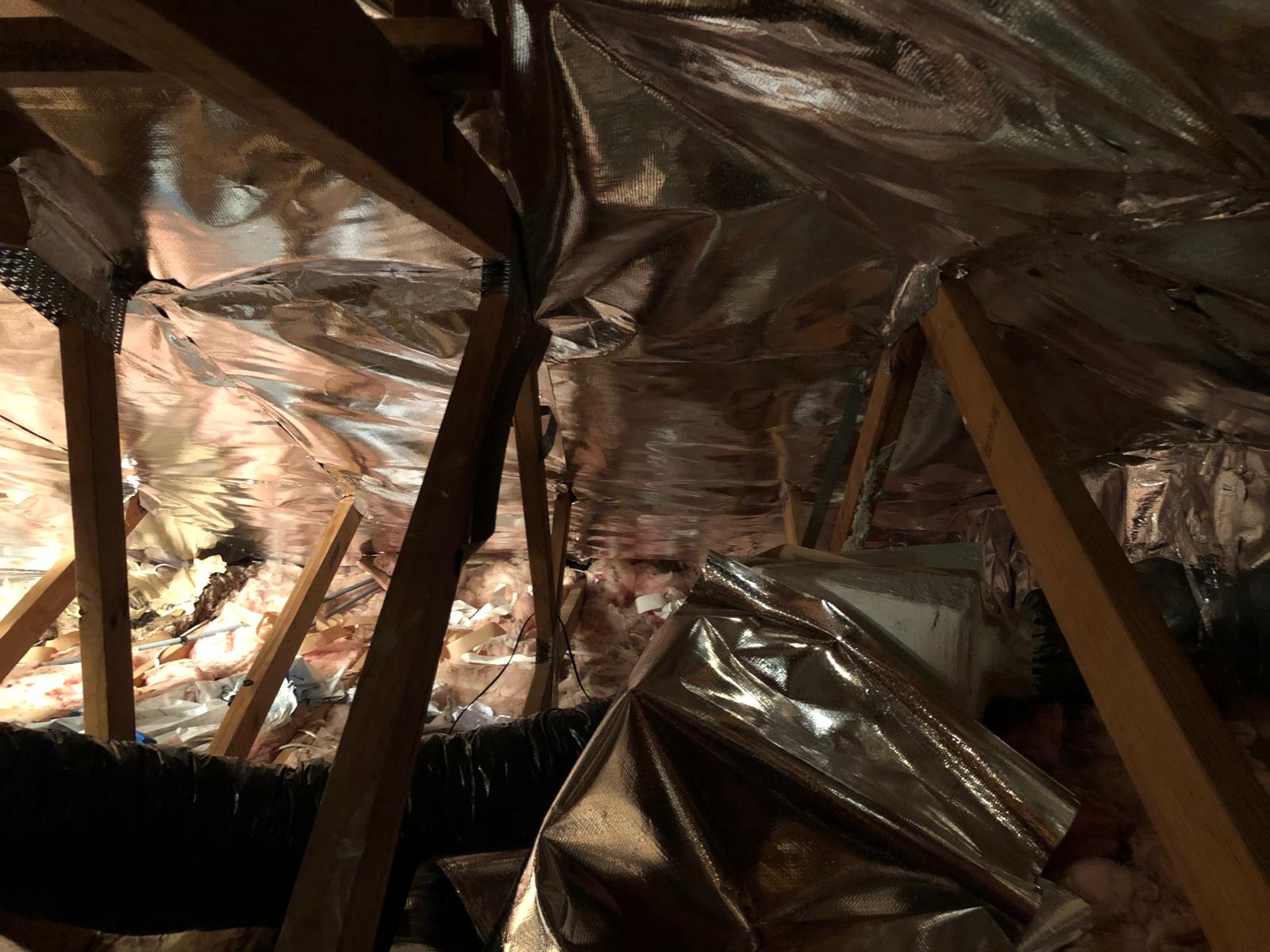 Attic interior before insulation upgrade
